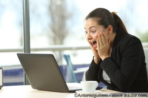 businesswoman checking laptop