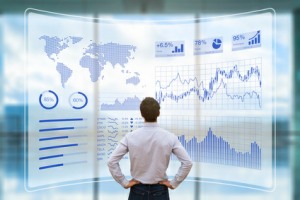 Business Person analysiert Big Data auf einem modernen Display